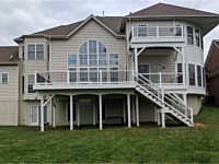 <b>2 Level Deck with Trex Select Saddle Decking with White Washington Railing and Black Aluminum Balusters-Fascia and Support Posts and Beams are wrapped in White Vinyl</b>